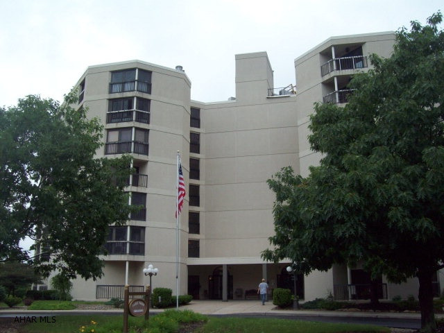 Large 4th floor corner condo with panoramic views.  Master bedroom has a large bath with jacuzzi tub.  Wet bar and mirrored cabinet in living room.  Association fee covers water, sewer and trash.  Underground parking space with storage unit.
