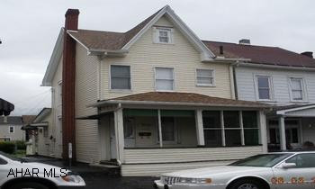 "FLIP THIS HOUSE" OR GOING TO THE ALTOONA CAMPUS?  THIS IS BETTER THAN RENTING AN APARTMENT!  New furnace, water heater, roof & windows.  Enclosed sun porch on the back of the house with small gas stove.  Cleaned up & already for you to move into.  Call Patty Chwatek @ 814-285-0314 to be shown.  BRING OFFERS!