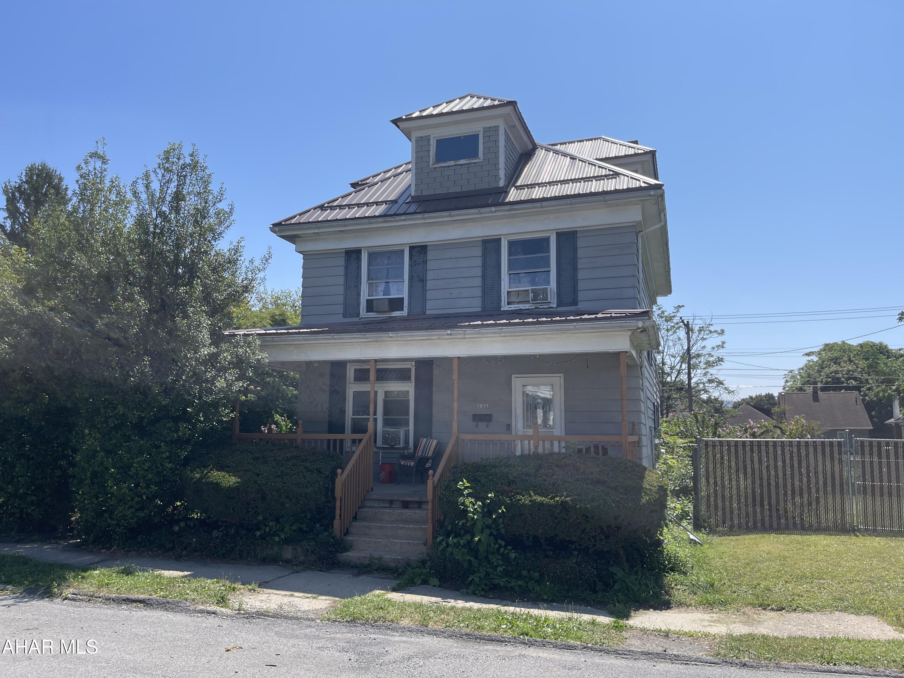 ....VERY MOTIVATED SELLER! BRING OFFER!!!  BRAND NEW PRICE!  Lots of Square footage for this price!!  This home welcomes you with Beautiful woodwork, character and charm.  Very spacious and great area to raise your family.  This home is nicely situated on THREE city lots and the yard is level. Great space for the kids and dogs!  Not to mention cookouts on the deck!  2 FULL Bathrooms - no need to 'wait your turn'...............