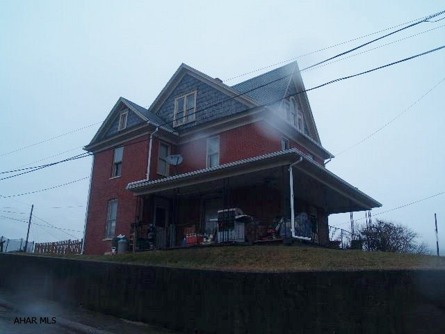 Classic brick home in the Boro of Roaring Spring.  The current owners use this home as a single family investment property.  With some personal touches and updates it would also make a fabulous starter home.  This home has hot water heating and updated electric.  With large rooms on the main level, three bedrooms on the second floor and additional attic for storage this is the quintessential Roaring Spring home.