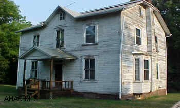 Bob's Creek runs through property.  House on one side of road, barn on other side directly across - beautiful setting. New furnace. Property to be subdivided by buyer - includes up to 10 Acres.  Natural trout stream - not known if in flood zone, would assume property needs TLC could be beautiful - first floor laundry.  Septic is stream discharge.