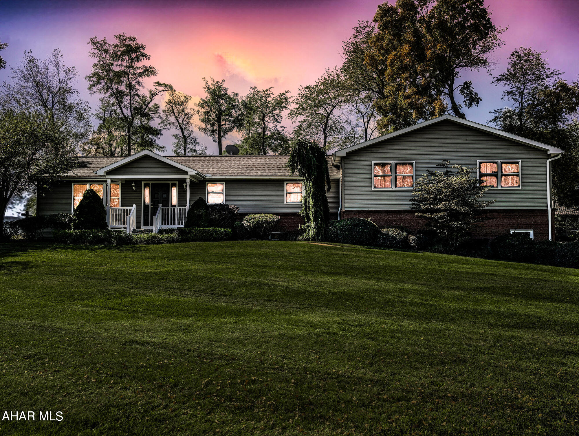 360 degree view of the mountains make this a one of a kind property. This picturesque property comes with a fantastic pavilion complete with stone fire pit, electric, instant hot water tank, wet bar, and an attached work shop/garage. This meticulously maintained home has mature foliage, cement driveway, dog kennel, and a 2 car heated, integral garage with 10 foot high insulated garage doors with openers.  Private back patio that leads into the large open kitchen.  The open kitchen is great for entertaining large crowds and overlooks the beautiful back yard.  Main bedroom has large walk-in closet, sitting area, and full bath complete with soaking tub and large standup shower.  There are radiant heated floors though out the house with additional mini splits for air conditioning and secondary heat source. Other great features of this home are the first floor laundry with secondary laundry/full bath in basement, large great room in basement, basement bedroom/office with cedar closet, heated basement work shop, and so much more.  Close to Buchanan state forest, sweet root park picnic area, Shawnee state park, Rocky Gap, Koon Lake, and only 15 minutes to Bedford.
