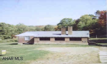 1 STORY BRICK RANCH APPROX 1 ACRE LOT, STONE GARAGE BUILT INTO GROUND NEEDS NEW ROOF, ETC.
