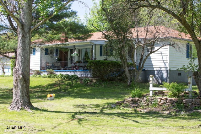 Enjoy Homer's Gap with this lovely spacious ranch home that has three bedrooms and two and a half baths, along with a detached over-sized two car garage.  The basement is large and ready for your storage needs.  The sewer tie-in will be completed prior to closing, at no expense to the buyer!  The home features many updates! Master suite is currently being used as an in law suite with a kitchenette!  Spacious rooms, privacy on two acres, and the charm of Homer's Gap!  Don't miss this one!