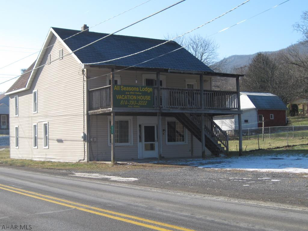 Contractors / Flippers / Investors - Two Rental Units or Easy to convert to a Single Family Home. Unit #1 includes, Kitchen, Dining Room, Laundry Closet, Two Bedrooms and a Full Bath with a Stand-Up Shower. And Thermo Pane Windows. Unit # 2 includes, Kitchen, Dining Room, Three Bedrooms and a Full Bath with a Tub and Shower Enclosure. And Thermo Pane Windows. - Needs Major Work Which Includes -  Floor Trusses Need Replaced. Along With Kitchen Floor. Kitchen Cabinets Need Secured. And Hall Floor In First Floor Unit Needs Replaced. Separate Electric Meters - Close to Raystown Lake. Property Being Sold AS-IS In It's Present State. Warning Presence of MOLD. Yes, The Property Needs A Considerable Amount Of Work. MOTIVATED SELLER  ! BRING AN OFFER ! 203K Financing May Be A Way To Go On This One.