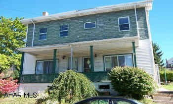 sold as is. double house currently used as a single family.  No kitchen on second side.