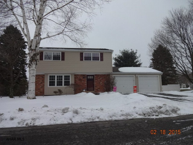 Look no further, this house has it all! Stay warm this winter by the fireplace or watch the game in the finished basement with wet bar. When warm weather comes this house has a large back yard with privacy fence, in-ground heated pool and patio area. Oversized two car garage with newly insulated ceiling and insulation panels on garage doors.