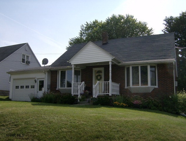Ebensburg 3-4 BR, 2  bath brick & vinyl sided home on a 63 x 132 level yard. Gas HW radiator heat. 1 car attached garage. Move in condition.