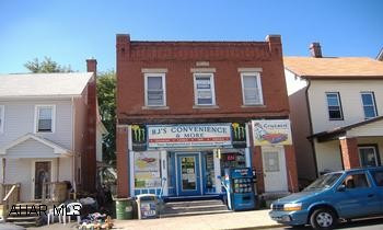 2 BED APT UPSTAIRS......SEPARATE ELECTRIC....CENTRAL AIR STORE IS BEING RENTED OUT ...NOTHING IN THE STORE IS INCLUDED IN THE SALE OF PROPERTY