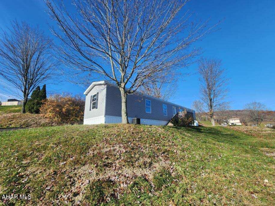 Superb 2020 Eagle River includes central air and new propane. Exceptional quality with ample natural light throughout, and solid craftmanship. $335/mo. lot rent includes trash removal.