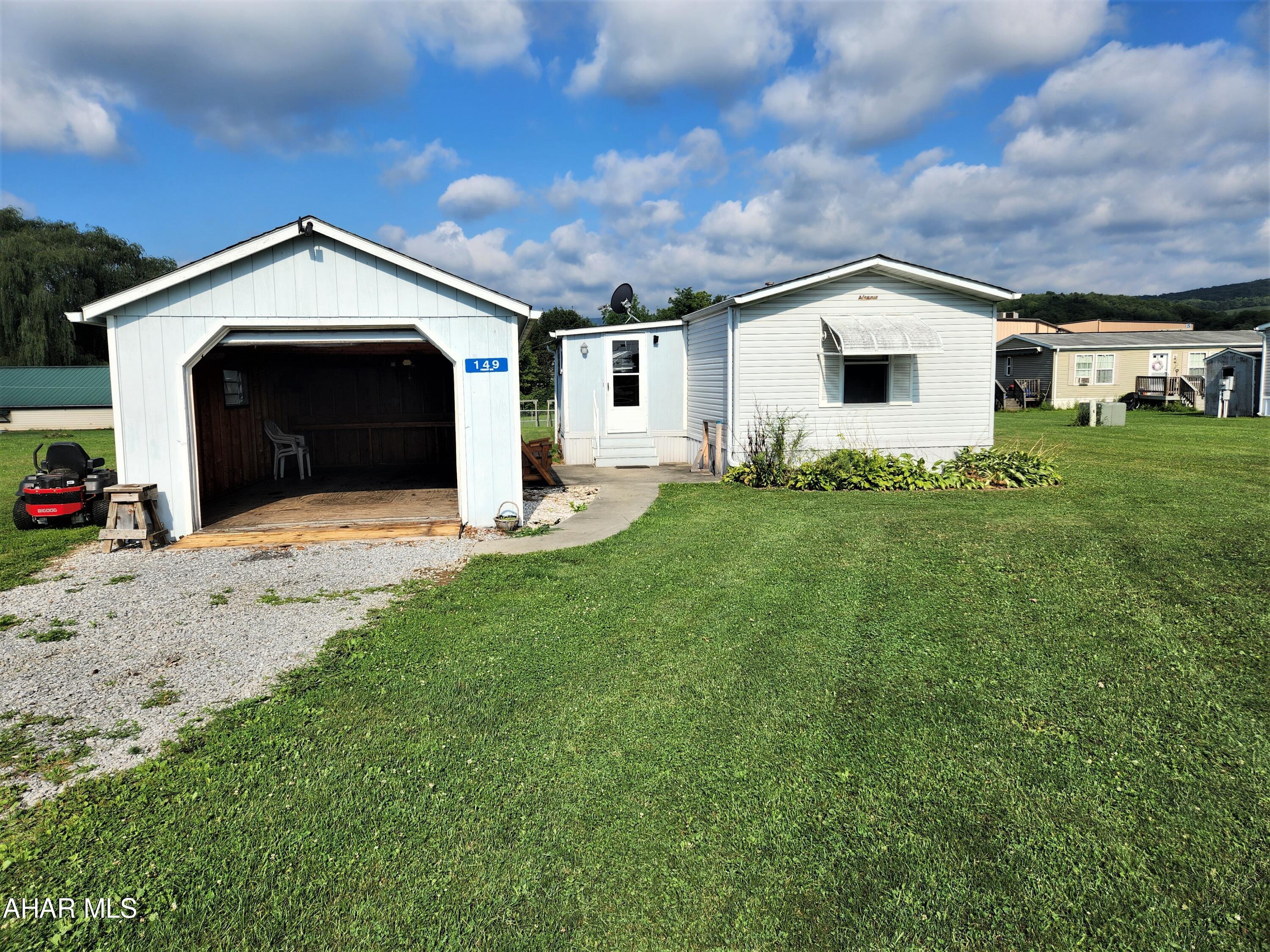 Are you looking for a place to rent with one floor living?  Then come take a look at this home.  It has been well-kept and offers a large yard for outdoor enjoyment.   It features a nice-sized living room and an eat-in kitchen.  The one bedroom is attached to an ensuite full bathroom.  The other bedroom is on the opposite side of the home and has a bathroom beside it. Do you have a pet and  are having trouble finding a rental?  No problem, the landlord will allow one pet in the home.   The month to month lease won't tie you down if you are looking to buy a home and need to move quickly.  Come take a look, this may be your next home sweet home.  Landlord pays for sewage and garabage.  Tenant pays all other utilities. Additional $50 monthy fee and an additional security deposit of $300 for a pet.