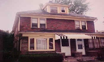 Half of a duplex - home is in nice condition. Extra lot to the back is included. Range and refrigerator DO NOT STAY. The light in the kitchen over the table is being replaced. Third floor could be a fourth bedroom. NO CENTRAL AIR - window unit. Half of a duplex - home is in nice condition. Extra lot to the back is included. Range and refrigerator DO NOT STAY. The light in the kitchen over the table is being replaced. Third floor could be a fourth bedroom. NO CENTRAL AIR - window unit.