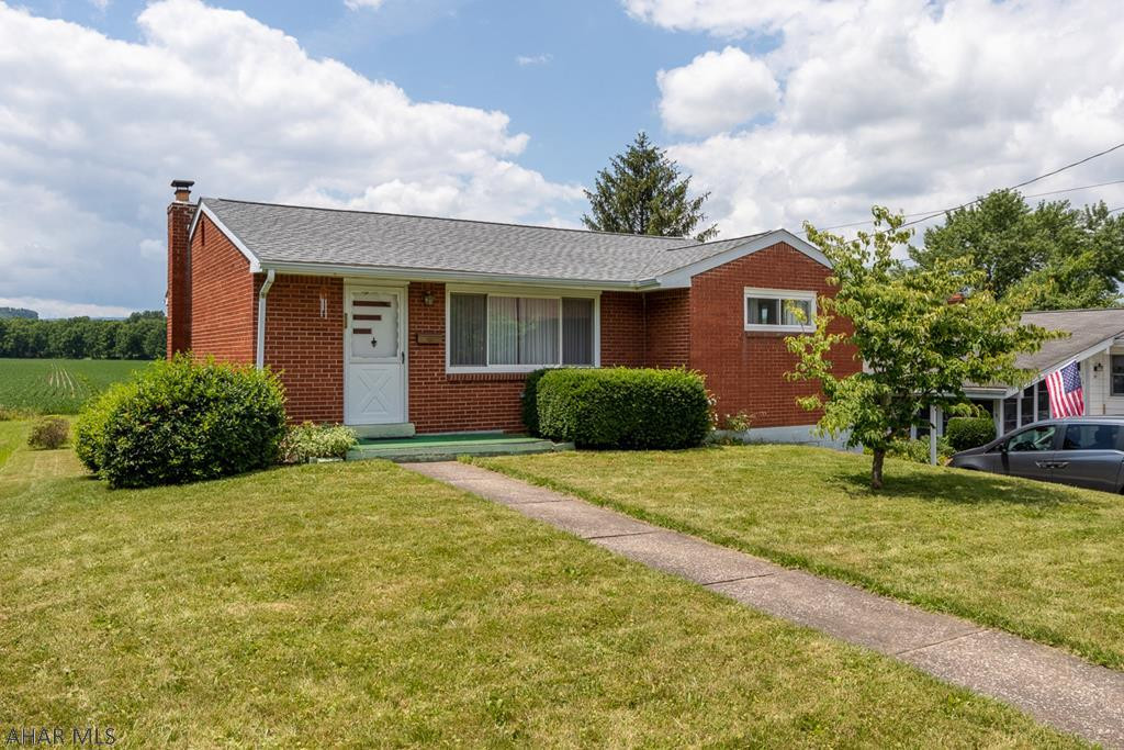 Hollidaysburg Cutie!  3 bedroom Brick home with hardwood floors in Living Room and Bedrooms.  Whole house has been freshly painted.  Full basement offers additional usable space.  Was an integral garage but has been closed in.  Carport and small patio.
