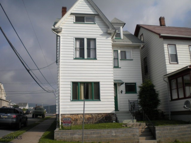 Currently duplex but could be a single family.  New carpet & freshly painted - nice interior.  Furniture tables & lamps are negotiable.  Appliances convey as is.  1st Floor - 1 Bedroom - 2nd Floor 1 Bedroom w/ heated 3rd floor for 2nd bedroom.