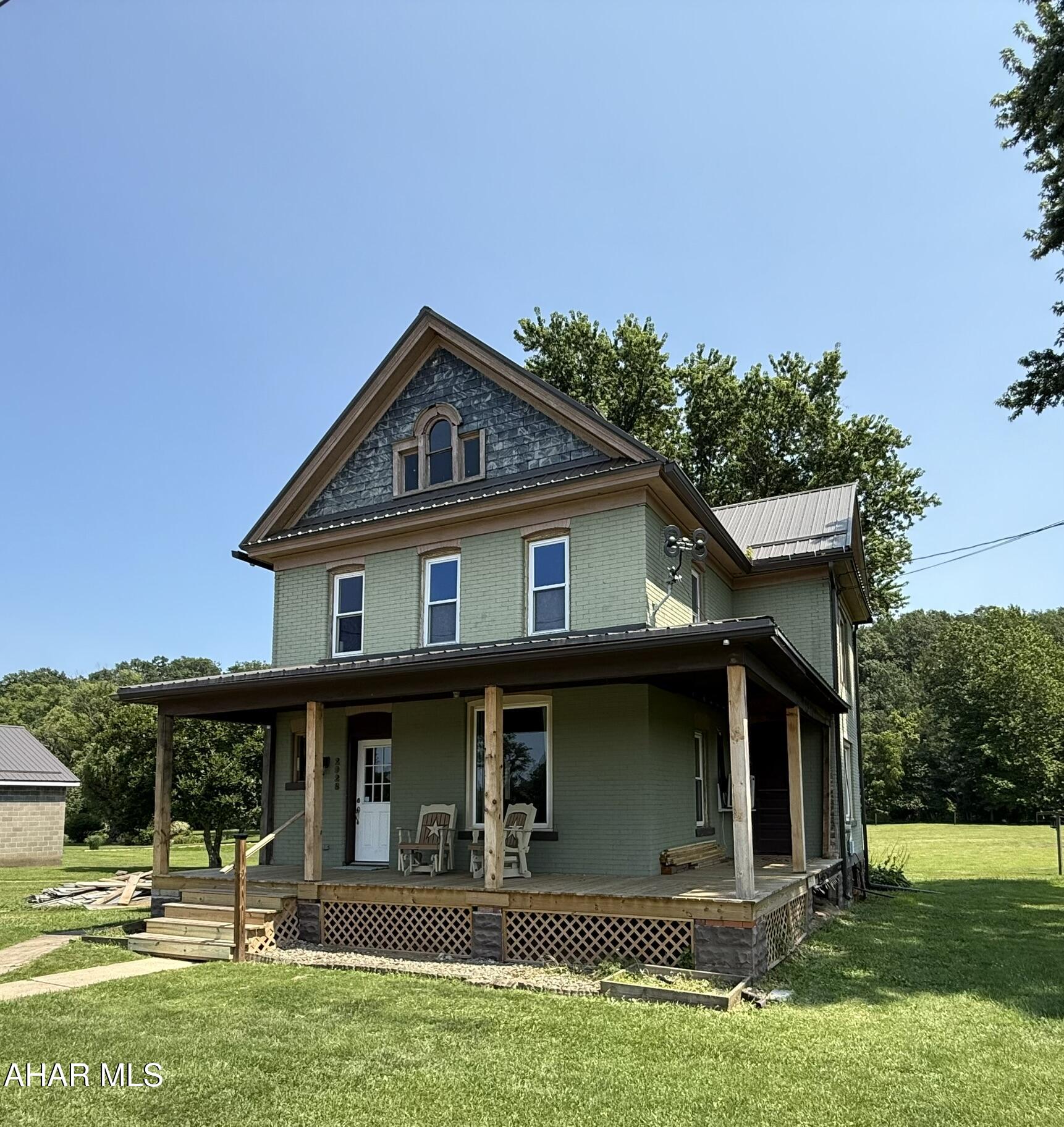 Craving wide-open space, freedom to grow, and room to make it all happen? This 3-bedroom, 2-bath farmhouse in East Freedom sits on over 2 acres and is packed with possibilities. Whether you're bringing animals, tools, or big dreams—this property is ready to support your lifestyle.

The land features a stable and was previously set up for horses and chickens, making it an ideal spot for hobby farming! You'll also enjoy a mini orchard with apple, peach, and cherry trees—perfect for fresh harvests right from your backyard.

An outdoor wood boiler, installed in 2020, keeps the home warm and efficient through the colder months whether being used as the main heating source or as a supplemental heating source. 

The oversized garage is a true bonus, offering 240V electric service, a 12-foot overhead door, and tall ceilings—perfect for a lift, workshop, or serious storage.

If you're ready to start a homestead, launch your next project, or simply soak in the quiet of country living, this property offers the space and freedom to do it all. Opportunity like this doesn't come around often—schedule your private showing today!