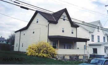 Good exterior, Neds some work inside Large duplex with new vinyl siding, windows, shingle roof in 4/99