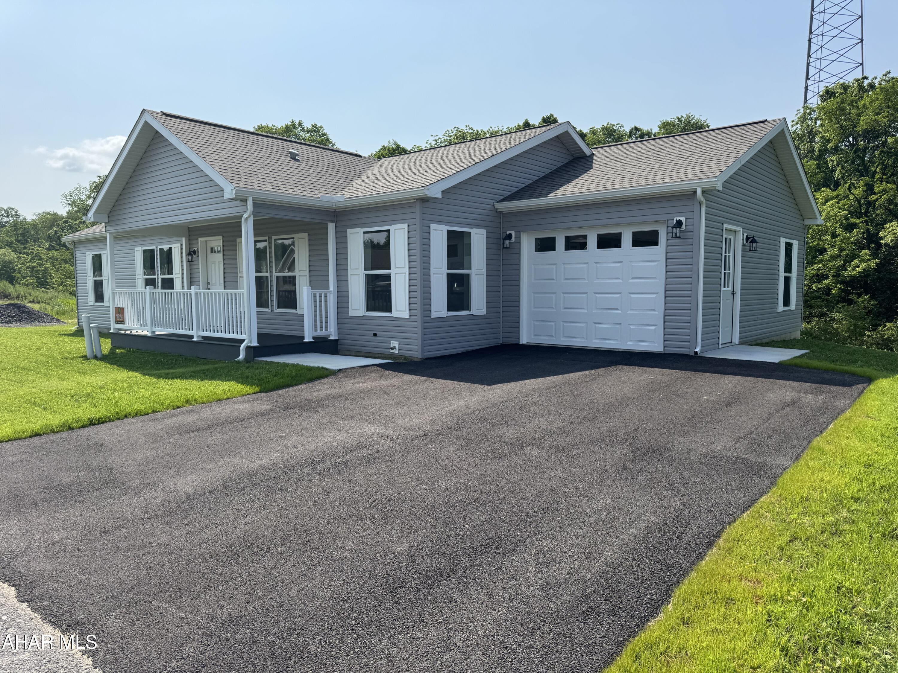 New construction, never-before-lived in, 1-floor, 1-step entry appx. 1,400 sq. ft. 2 bed/2 bath with home office/den manufactured home.  Set amongst other all-new homes at the newest active adult 55+ community in  region, this home features open living spaces with a feature-packed kitchen, stainless steel appliances, an attached 1-car garage with macadam driveway and covered front sitting porch.  All (underground) public utilities, natural gas heat, high-speed connectivity and a friendly, welcoming community convenient to the region's amenities make this home one to not miss.