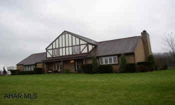 LOVELY TUDOR STYLE HOME ON 1+ ACRES IN SCOTCH VALLEY. COZY 1ST FLOOR FAMILY ROOM WITH WOOD FIREPLACE. LARGE KITCHEN WITH SEP. EATING AREA.