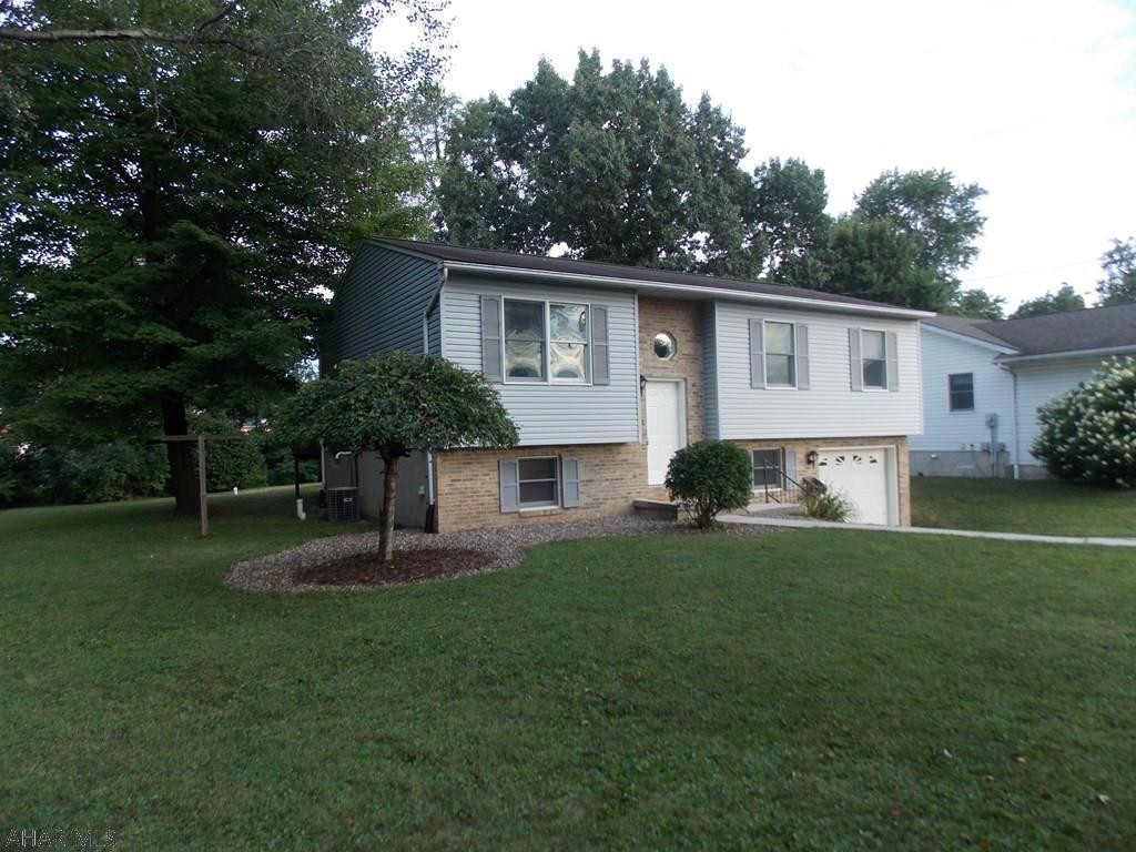 Hurry or you will miss the opportunity to own this perfect home.  Spotless from top to bottom this home has all new flooring and fresh paint.  3-4 BRs and 2 Full Baths, CA, private back yard & deck and a 1 car garage are just a few of the things you will love about your new home.  Quiet neighborhood in Baker School area and very conveniently located near I99, shopping and restaurants. The landscaping has been redone and adds to the curve appeal.The Train only goes through twice a week. Thursday about 1:00 PM and Sunday at 2:00.  Call us today!