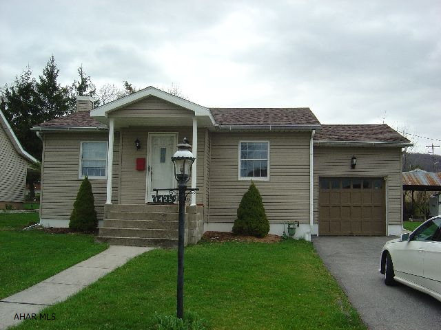 Raised Ranch, 2 bedroom, 2 bath, sunroom off kitchen, garage, central air, new roof, and furnace. Huge trailer/carport, 2 sheds, corner level lot 125 x 132. Great location!