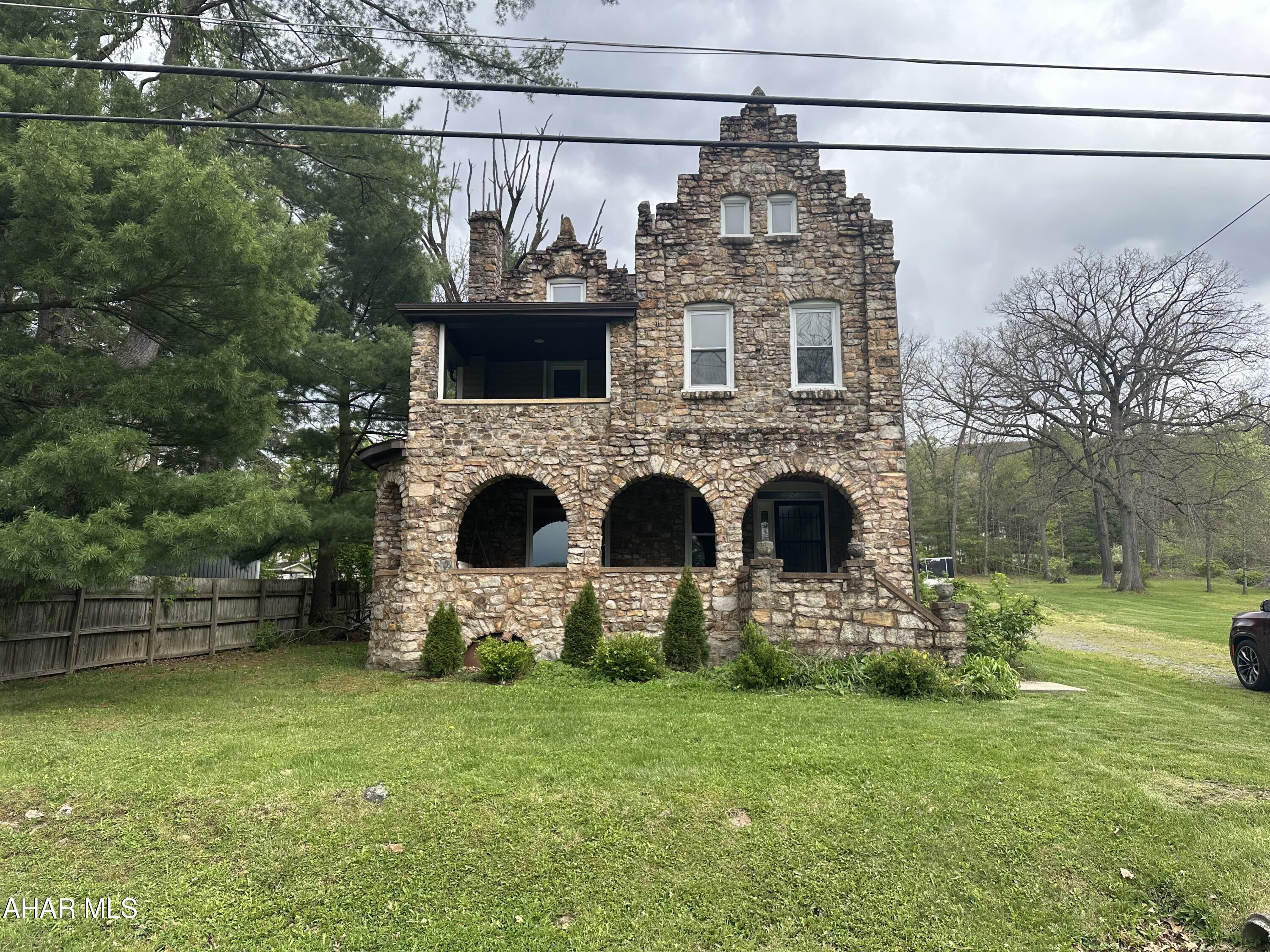 One of a Kind Stone Castle on 1.2  acres. Step into timeless charm with this completely remodeled stone castle offering character, luxury. This unique home blends old-word elegance with modern updates throughout. A rare opportunity to own a truly unforgettable property with stunning craftsmanship and exceptional style. Can't forget the inground pool for a summer oasis.