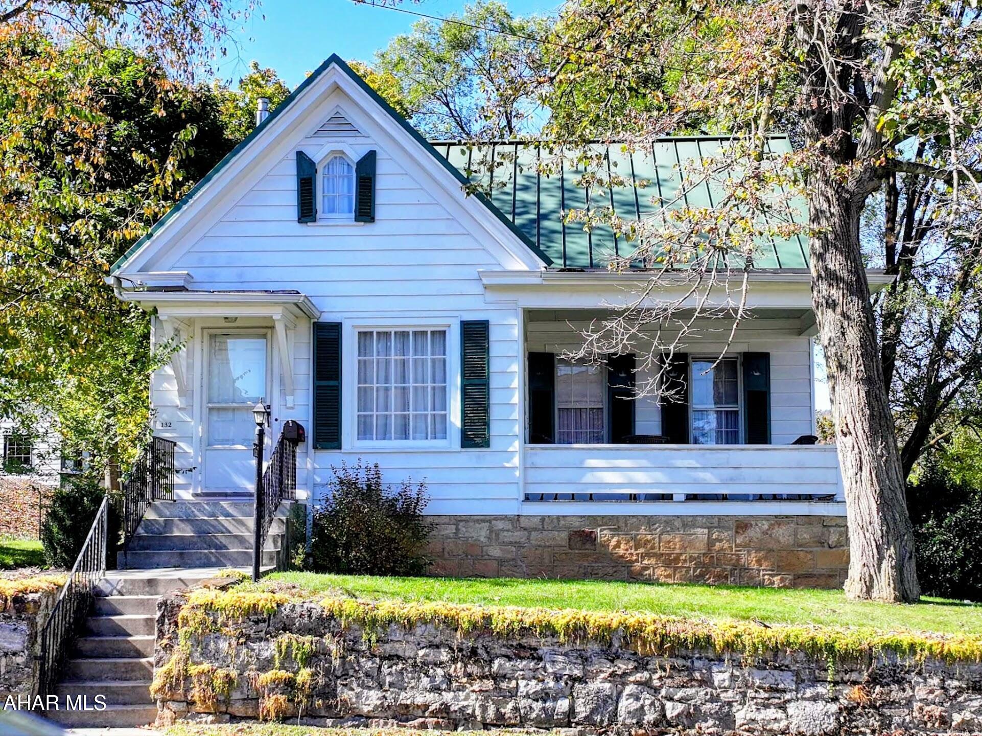 Charming Cape Cod in the Heart of Downtown Bedford.

Experience timeless elegance and modern comfort in this beautiful four-bedroom, three-bath Cape Cod, perfectly situated in lovely downtown Bedford. From the moment you step inside, the original hardwood flooring, arched doorways, and vintage glass door handles reflect the craftsmanship and character of a bygone era, paired seamlessly with today's thoughtful updates.

The custom kitchen, designed by Buterbaugh Kitchens & Baths, features solid maple cabinetry with original built-in corner cabinets and abundant storage - a true showpiece that blends warmth and function. The dining room offers a stunning picture window that fills the space with natural light and views of the charming neighborhood.  Throughout the home, you'll find an incredible amount of storage.  

The basement, with its beautiful stone foundation walls, adds to the home's character and includes a laundry area and half bath- a perfect mix of old-world charm and practicality.

Enjoy year-round comfort with central air, a dual-zone heating system with natural gas hot-water radiator heat, enhanced by blown-in insulation for energy efficiency. 

Set on a large corner lot, the property offers plenty of outdoor space for gardening or adding a detached garage, along with a cozy front porch ideal for relaxing and watching the world go by.

Step into a home that truly embodies the spirit of downtown Bedford living - rich in history, beautifully maintained, and ready to welcome its next owner.