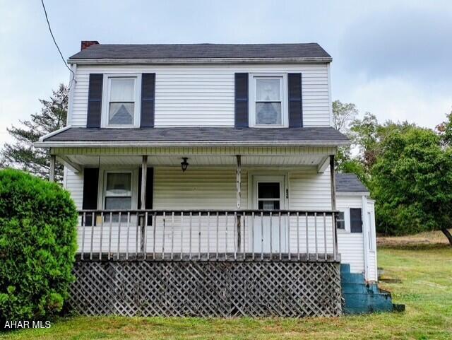Sitting on 2.66 acres with beautiful views, this two-story home offers 3 bedrooms, 1.5 bathrooms, and plenty of potential. You'll find a cozy fireplace, an inviting front porch, a one-car garage, and an outbuilding for extra storage. The property has a well and septic, oil heat with a furnace less than 10 years old, a hot water heater around 3 years old, and a roof approximately 15 years old. The home does need some work, but with its country charm, solid features, and spacious setting, it's a great opportunity to make it your own.