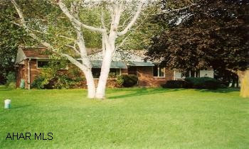 Nice 3BR Brick Rancher on beautiful 2+ acre lot in the Village of Ryot. Home includes large Living/dining room combination, hardwood floors, modern kitchen, utility room, and a large family room w/wood burning fireplace. Property also has 2 storage sheds
