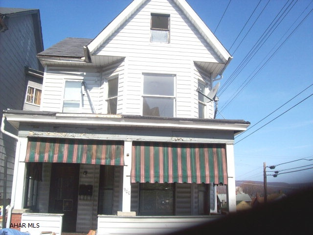 Unit 1 has large living room, dining room, kitchen, 1 bedroom, & full bath. Unit 2 has living room, kitchen, 2 bedrooms, 1 office, full bath, access to attic for plenty of storage. Full, unfinished basement with laundry hook-ups. 1 car detached garage. Separate electric. Some TLC needed. Vacant - easy to show. Owner wants to sell. Bring offers. Includes 2 refrigerator & 2 stoves. Close to public transportation and shopping centers.