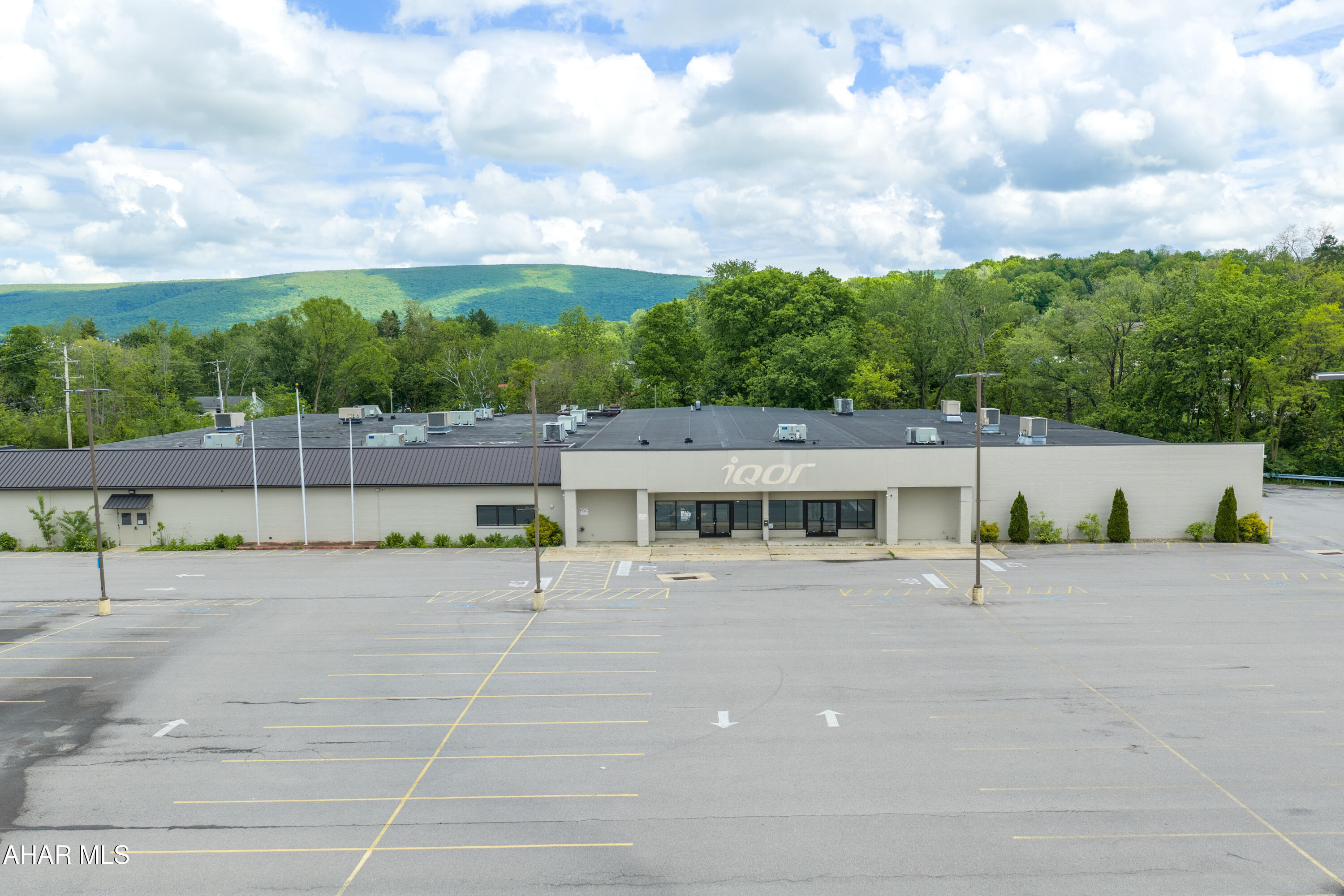 Perfect opportunity to develop a commercial property in a high traffic area of Altoona.  Located near the PSU campus, easy driving distance to UPMC Hospital, retail and other amenities, this property is a great possibility for medical, educational, retail or office facilities.  One story design with overhead doors and abundant parking spaces.   Generator is EXCLUDED FROM SALE.