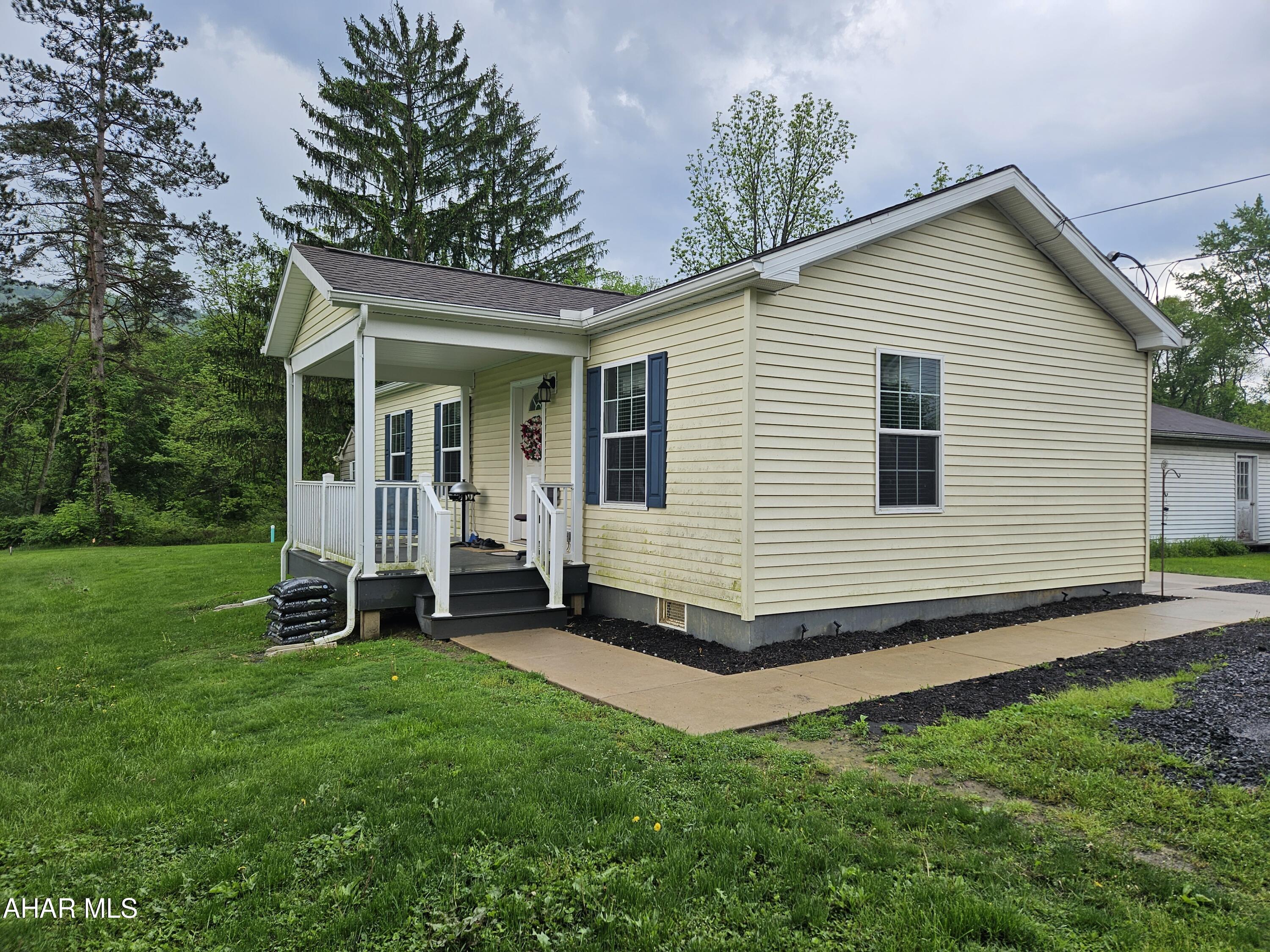 This newer well-kept 2BR, 1BA modular home offers comfortable, single-level living with a bright, open layout. The kitchen is clean and functional, and both bedrooms provide generous space and storage. Fresh updates make it move-in ready, with a manageable yard and convenient location close to local amenities. The shed is included for more storage.  A perfect option for first-time buyers or those looking to downsize!