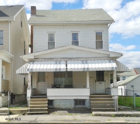 2 unit investment property in nice neighborhood. Thermopane windows, covered front porch, off-street parking.