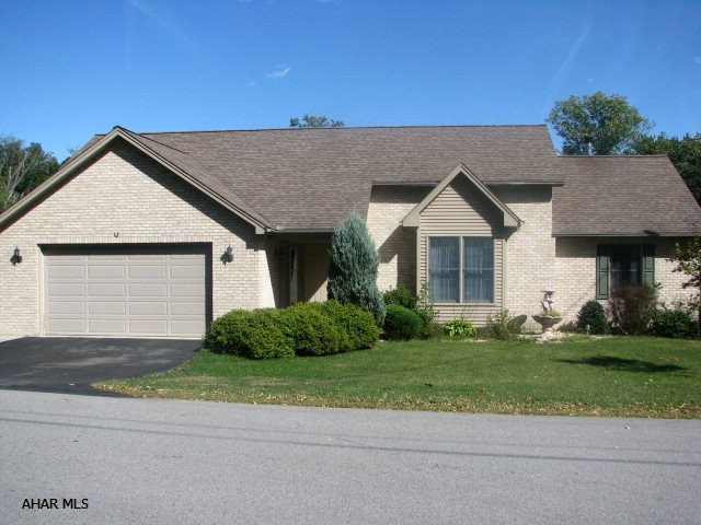 This well built home is in extremely good condition and is looking for someone to enjoy it as much as the previous owner did. The location puts you away from all traffic, other than local, yet you are close to almost anything you could want. All the woodwork & cupboards are done in a whitewash stain which is extremely rich looking & catches the eye. Huge living room with cathedral ceiling which leads to a feeling of grandeur as you enter the front door. New carpeting in the living room & hall. In most homes the kitchen is the hub! This home has a large island to gather around along with plenty of cupboards. The Master Bedroom Suite is located on one side of the home while the other two bedrooms & bath is on the other side. Massive fin. basement with a walkout to cement patio.