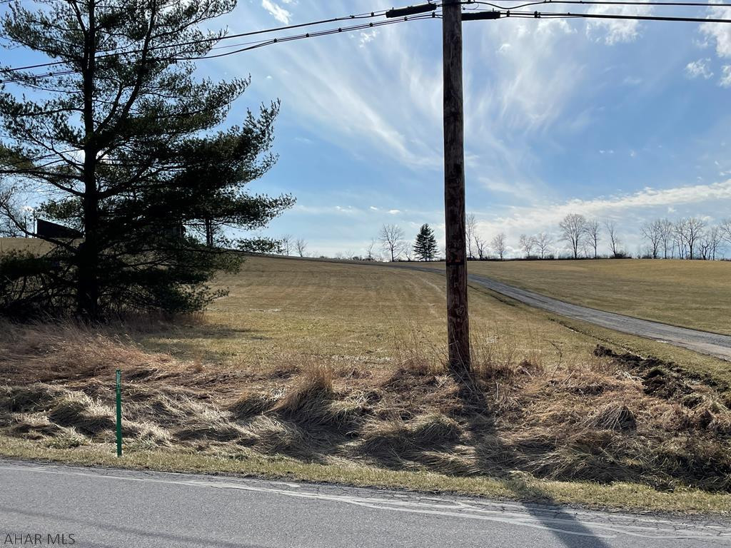 nice level lot with awesome views of the country. Close to PA Turnpike and I-99. 5 miles to downtown Bedford. Great location for your new home. Public water and sewer available. Buyer is responsible for tap fees with Bedford township.