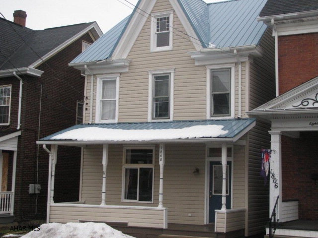Must see inside this renovated Tyrone home --offers 1st floor open floor plan for living room w/ fireplace & built ins, newer kitchen w/island and dining room w/ floor to ceiling built ins, all with unique hardwood flooring. Plus 1st floor 3/4 bath, 5 BR., 2nd floor laundry & full bath! 1 car detached garage & deck complete this home!