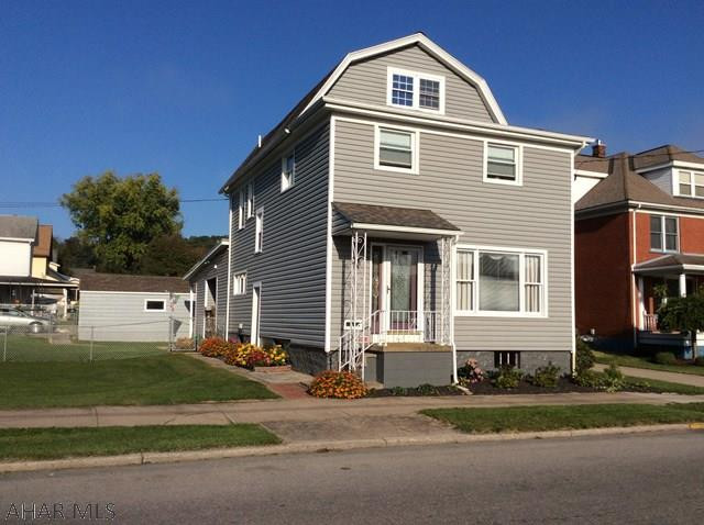 Absolutely stunning home. Great location, easy access to schools, parks, pool and downtown. Home offers new kitchen, new baths, all new wiring and plumbing. Home has thermo pane windows, newer metal roof on the family room, new flooring, fresh paint. Laundry on first floor or could be moved back to basement. There are two bonus rooms on the 3rd floor that could be used for 2 more bedrooms. Home offers wonderful closet space in the bedrooms and also throughout the home. Large flat corner lot that is partially fenced with a two car detached garage. Main roof, furnace and Central Air are newer. Don't miss this one.