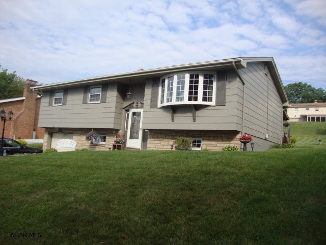 Fantastic well-maintained property in Pleasant Valley area of Altoona.  3, possibly 4, bedrooms and 2 baths.  House was meticulously kept up and updated and is move-in ready.  Many updates. Great curb appeal.  Granite vanity in main bathroom.  Very open and spacious living/dining room. Large family room with 2nd room downstairs that could be an office, exercise room, or even a 4th bedroom.  High efficiency Lenox Pulse furnace.  All newer thermo-pane windows.  Beautiful covered patio leading to open deck.  There's a lot to like about this home.