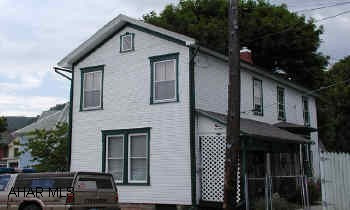 2 1/2 STORY HOME AND LOT WITH AN ADJOINING LOT FOR SALE.  BOTH PROPERTIES MUST BE SOLD, BUT CAN BE SOLD SEPARATELY. HOUSE AND LOT  ARE 102 W 12TH STREET AND ARE OFFERED AT 50,000.  THE VACANT LOT IS  1115 LOGAN AVENUE, BEING  60 X 88 WITH FENCING AND IS OFFERED AT $35,000.