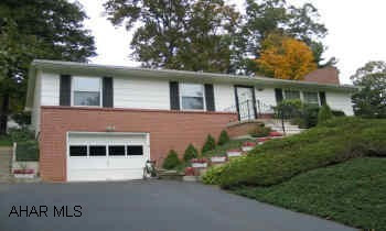 Shuttered three-bedroom ranch with brick accent. Large living room with fireplace. Nice neighborhood, close to schools and shopping.