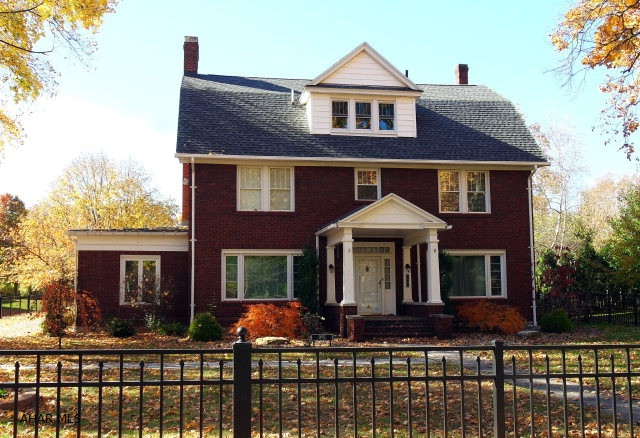 Stately 3 story all brick home has been completely renovated. As you enter the foyer you see the beautiful hardwood floors throughout and the original trim. Kitchen has cherry cabinetry  with a desk area. Formal dining room, living room with fireplace leads to a cozy sun room with another fireplace. The master suite has a walk-in closet with built-in shelving and new master bath. The third floor is totally finished with a 4th bedroom and a bonus room. The yard is completely fenced in with a front and back gate. The  driveway connects from Union Ave to Furnace Ave.Per assessment Est. 2017 taxes are estimated at $4,564.00