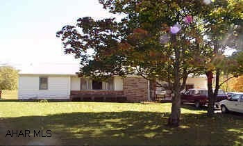 Great one story living convenient location nice size rooms newer roof & siding-New pump on well terrific yard. Freshly Painted!