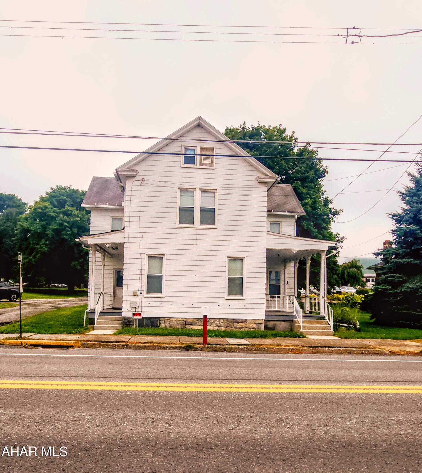 **Charming Two-Story Home with Endless Potential**

Welcome to 145 Main Street, Woodbury, PA—a delightful older home full of character and promise! This two-story residence, with its classic architecture, does need a bit of work both inside and out, but it's a diamond in the rough ready for your personal touch.

The home is set on a generous lot with a spacious yard, perfect for gardening, outdoor activities, or simply enjoying the peaceful surroundings. Several outbuildings offer excellent opportunities for storage, hobbies, or even a workshop—imagine the possibilities!

Inside, you'll find 3 cozy bedrooms and 1 full bath. The layout is inviting, but the interior does need some updating. The living areas are filled with potential, ready for you to create the perfect spaces for modern living. The kitchen, while functional, is just waiting for your creative ideas to transform it into a culinary haven. Upstairs, the bedrooms provide a peaceful retreat, but with some updates, they can truly shine.

Though this home requires some TLC, it's brimming with potential for renovation and customization. Whether you're a first-time homebuyer, a seasoned renovator, or someone who appreciates the charm of an older home, 145 Main Street offers a unique opportunity to create your dream home.

Located in the quaint town of Woodbury, this property offers the charm of small-town living with the convenience of being close to local amenities. Don't miss your chance to own a piece of Woodbury's history—schedule your showing today and start imagining the possibilities!
Selling as is!