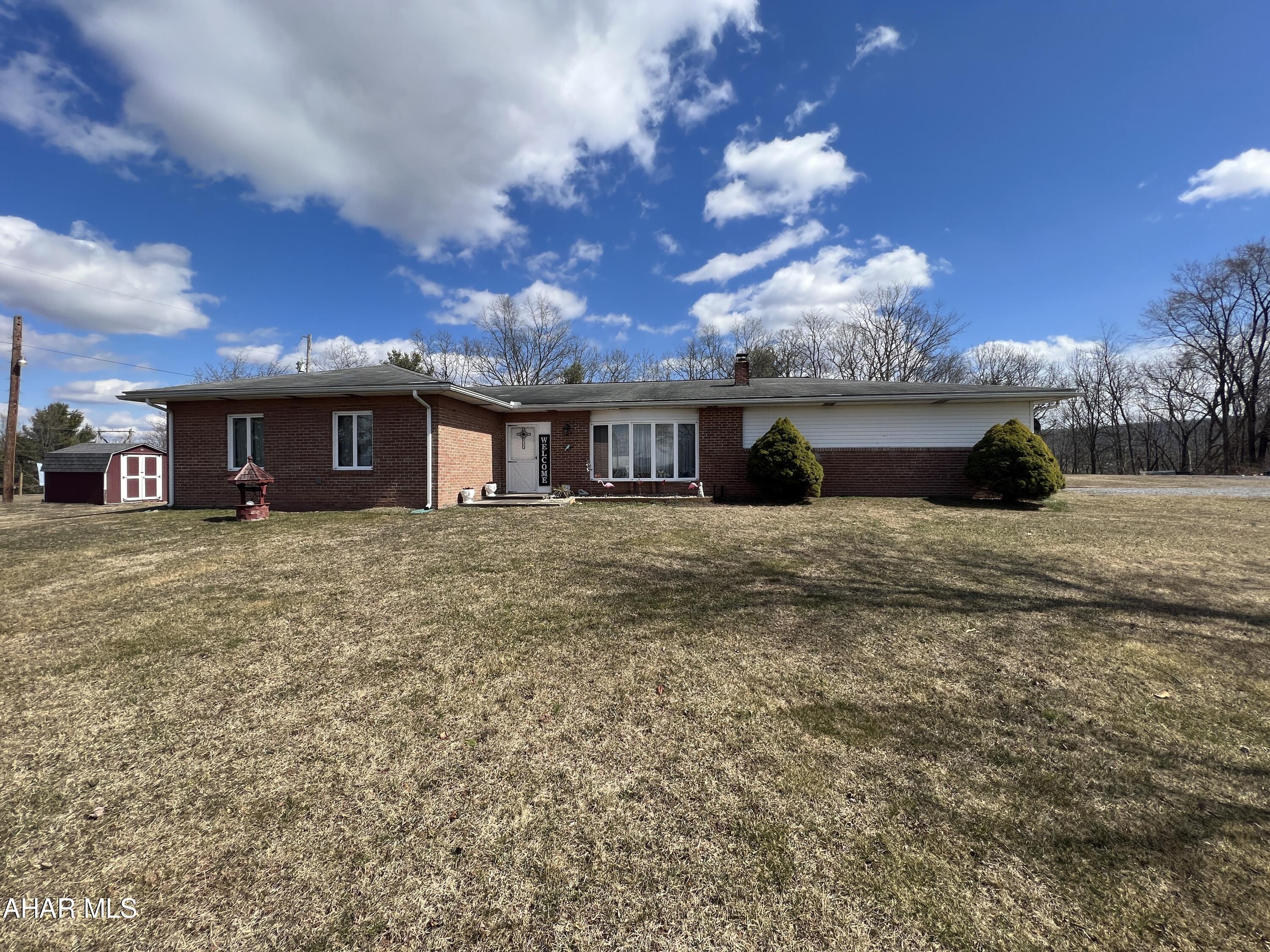 Well maintained brick home on just under an acre of land offering three bedrooms and two baths with a partially finished basement and attached garage. The main floor of the home offers a living room, eat-in kitchen, three bedrooms, and two baths. The partially finished basement offers a den with a fireplace, and two bonus rooms. Call the Listing Agent today to schedule a showing!