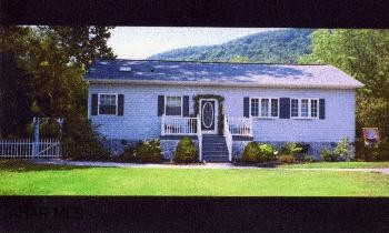 Immaculate raised ranch home on 7.75 ac. Heated in-ground pool. Heated-A/C gar/workshop w/private entrance. Beautifully landscaped. Too much to list!!! Immaculate raised ranch w/3-BR, 3-BA. Heated-Air conditioned gar/workshop. In-ground pool. Large deck. Too much to list!