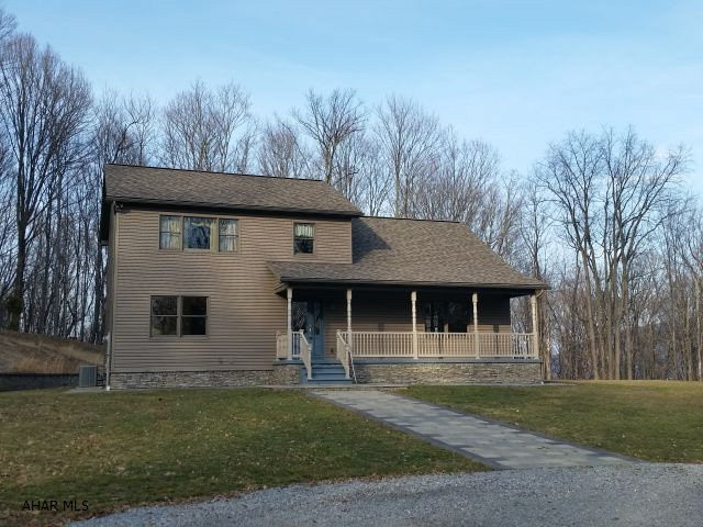 Beautiful secluded country setting in the woods. Nice front porch to watch the deer & turkeys, Vinyl sided 3 bedroom 2 bath home on 11.4 acres. Open floor plan, Kitchen with Counterbar, Spacious Master Bedroom with walk-in closet & Bonus Room with pocket doors, Master Bath with whirlpool tub & separate shower, Living Room with open floor plan & vaulted ceilings. 42x32 heated detached garage with electric. J-327