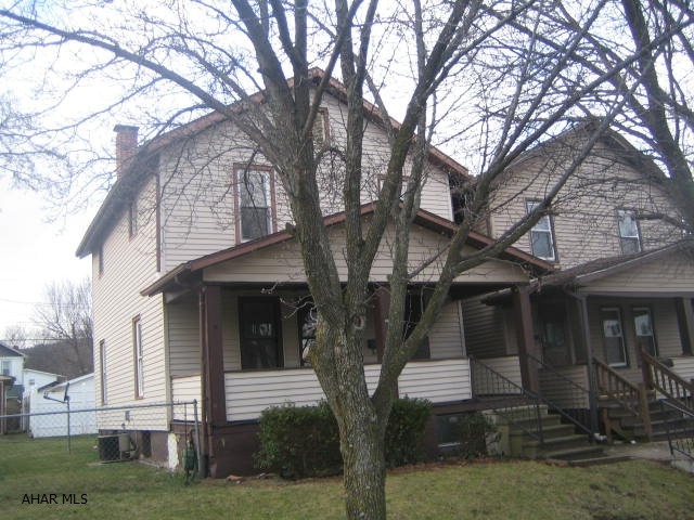 2 Story vinyl home with vinyl tilt windows, large living room, formal dining room and oak kitchen. Nice covered front and back porches, level lot and 1 car detached garage. Needs some TLC, but could be a perfect gem! Property sold as-is. Seller will make no repairs. Offers must be submitted through HUD approved broker. Buyer pays both transfer taxes. Marketed by MMREM.com. More properties at www.HUDhomestore.com. Exclusive agency. Equal Housing Opportunity.