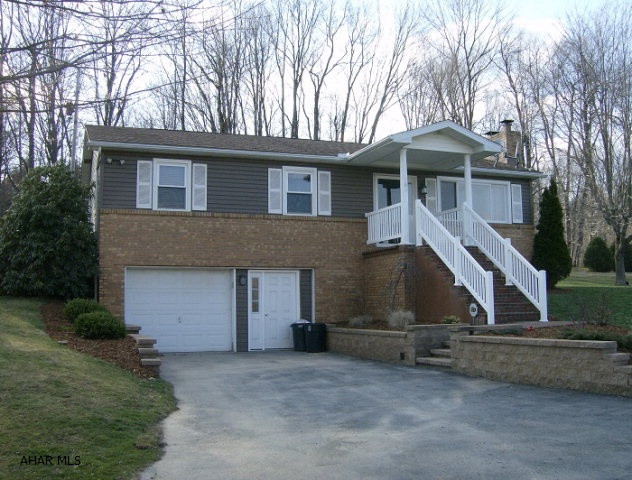 Totally remodeled 3 BR, 3 bath ranch home on private 3.6 acres. Large eat-in kitchen with quartz countertops. All baths updated in the last 5 years with tile flooring. Siding & roof done in 2009. Large 32 x 48 heated & drywalled 3 car detached garage, built in 2012. Recently landscaped lot.. And a 1 car integral garage. A must see!