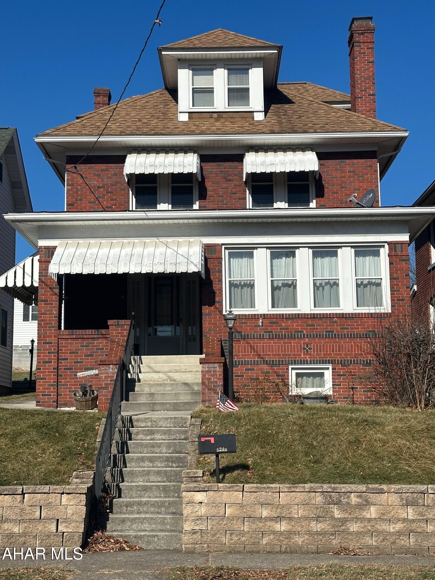 Step into timeless charm with this beautifully maintained 1920's brick home, where classic character meets thoughtful care. Featuring 3 bedrooms and 1½ baths, this home showcases original hardwood floors and a bright, inviting sitting room filled with natural light. The finished attic offers flexible space—perfect for a home office, playroom, or potential 4th bedroom. Outside, enjoy a fenced backyard ideal for relaxing or entertaining, along with the convenience of a detached 2-car garage. From top to bottom, this home has been lovingly cared for and is truly move-in ready. A wonderful opportunity to own a piece of history that's been beautifully preserved.