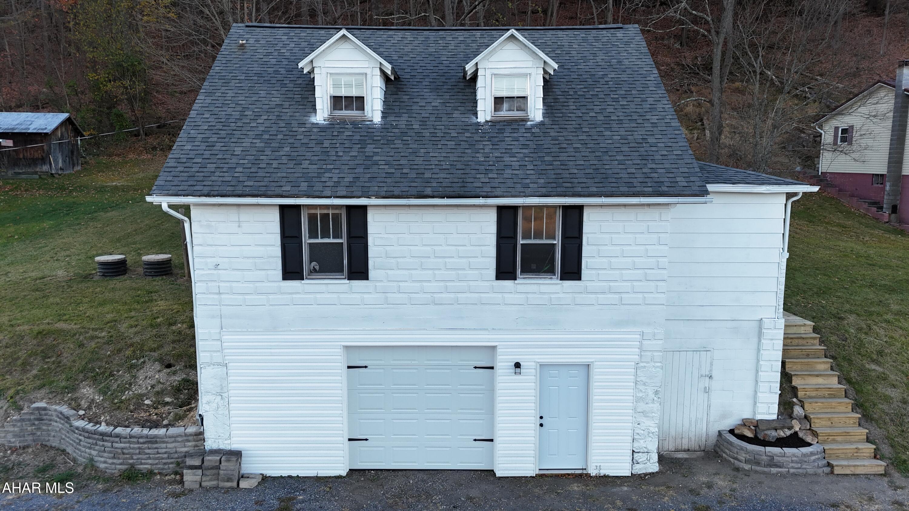 Welcome to 1081 Business 220! This stunning Cape Cod home is just minutes from Bedford Springs, with easy access to 220 and the PA Turnpike. Featuring numerous updates, this must-see property boasts three bedrooms, two fully renovated bathrooms, and a gorgeous new kitchen that opens into a spacious living room and formal dining room. Additional amenities include an oversized one-car garage, off-street parking with potential for expansion, scenic views, oil hot water baseboard heating, and a well and septic system on the premises.