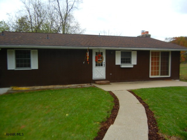 Great starter or retirement home.  Newly painted interior, basement is walkout and could be finished with additional bedroom, family room etc.  Whole house fan.  Access is at rear of property.  Deeded R-O-W from Reservoir Road to enable construction of garage and paved driveway.  See survey in photo section.